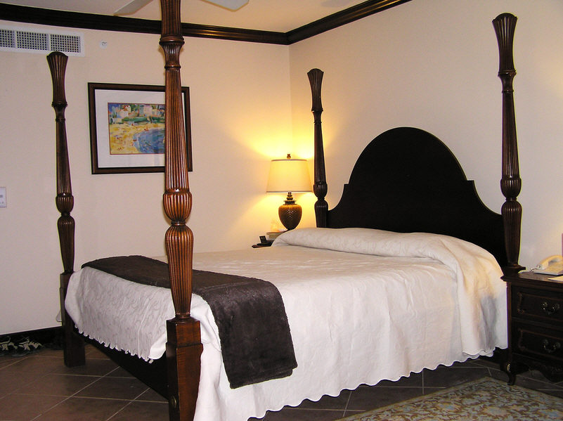 Our room, number 1206, in the French Village section of Beaches Resort.  Note the four entirely decorative bed posts.  (95k)