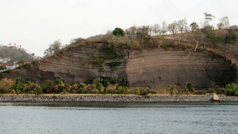 These layers of ancient ash are evidence of the volcanic origins of the island.