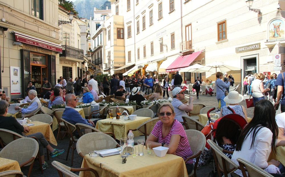Pavement cafe in Amalfi's main square at the bottom of the cathedral steps. You would not believe the prices they charge.