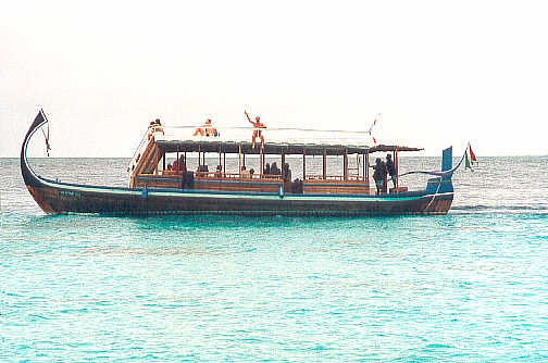 John waving as he returns from a successful dive trip. (29k)