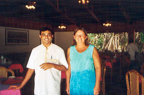 Our waiter Ahmed, grinning as usual, with Linda. (26k)