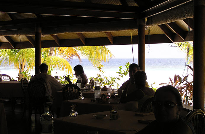 View from the restaurant out across the beach to the sea.  (63k)