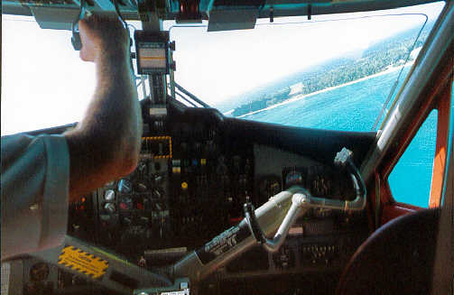 Coming in to land on the grass airstrip at Dennis Island. (24k)
