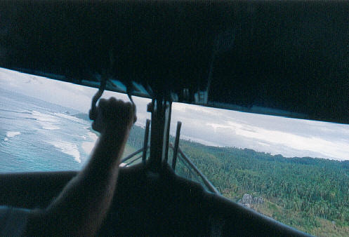 Coming in to land on the grass airstrip at Frigate Island. (30k)