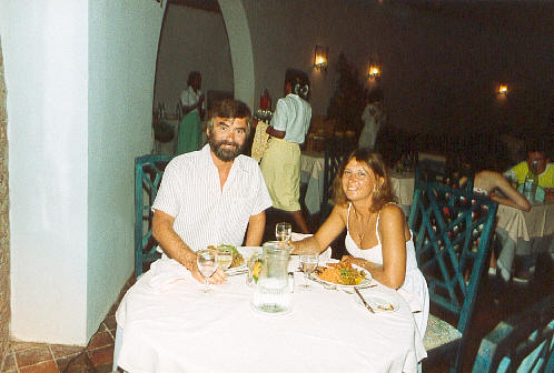 Enjoying a meal at the Beau Vallon Bay Hotel. (36k)