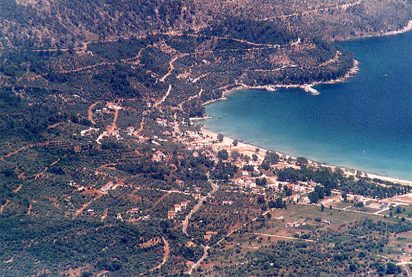 Close-up of Golden   Beach. Our studio is in the nearest of a block of three, towards the bottom of this picture, to the left of the main road leading into the village.  (70k)