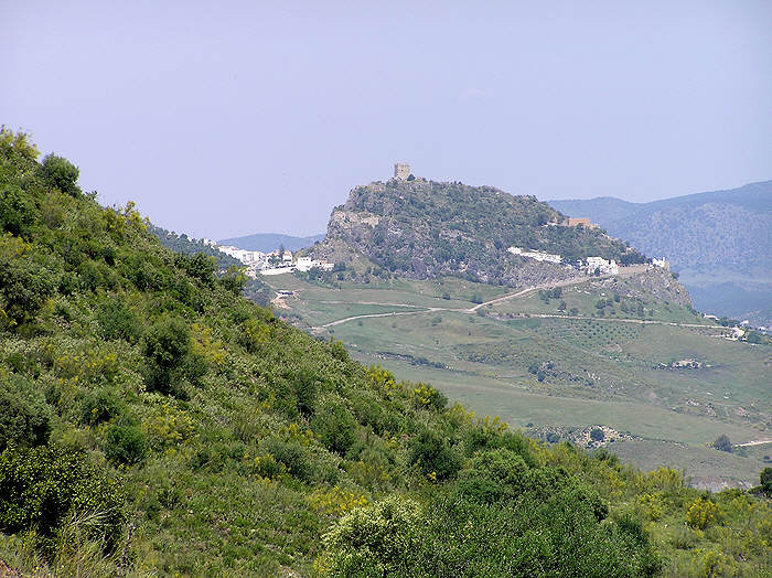 At last - Zahara in sight, dominated by the Moorish castle on the peak above it.  (94k)