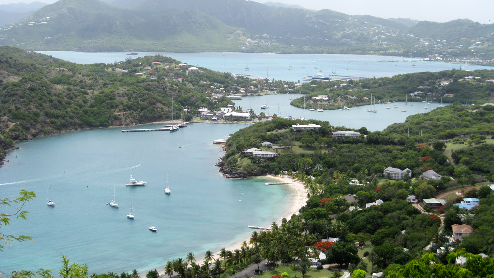 Nelson's Dockyard in English Harbour, with Falmouth Harbour in the distance, as seen from Shirley Heights.