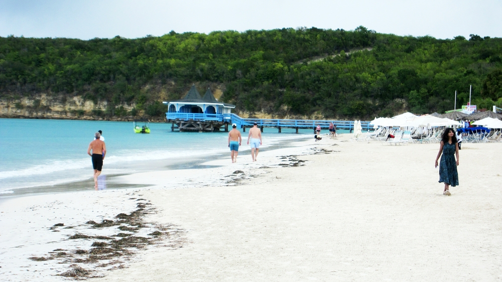 Looking further along the beach to the next resort area.