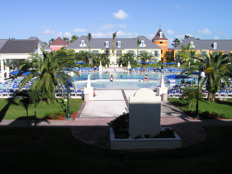 The view from our room onto the French Village pool early in the morning.  (157k)