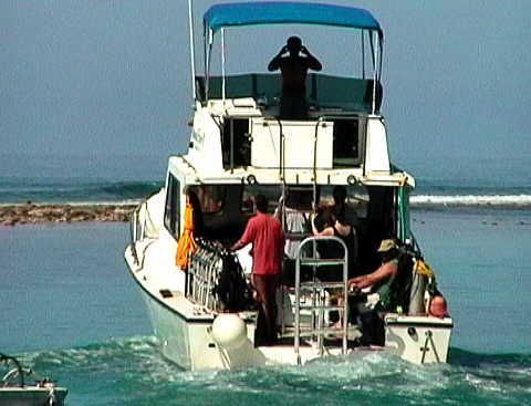 John (in the red t-shirt) off on the dive boat