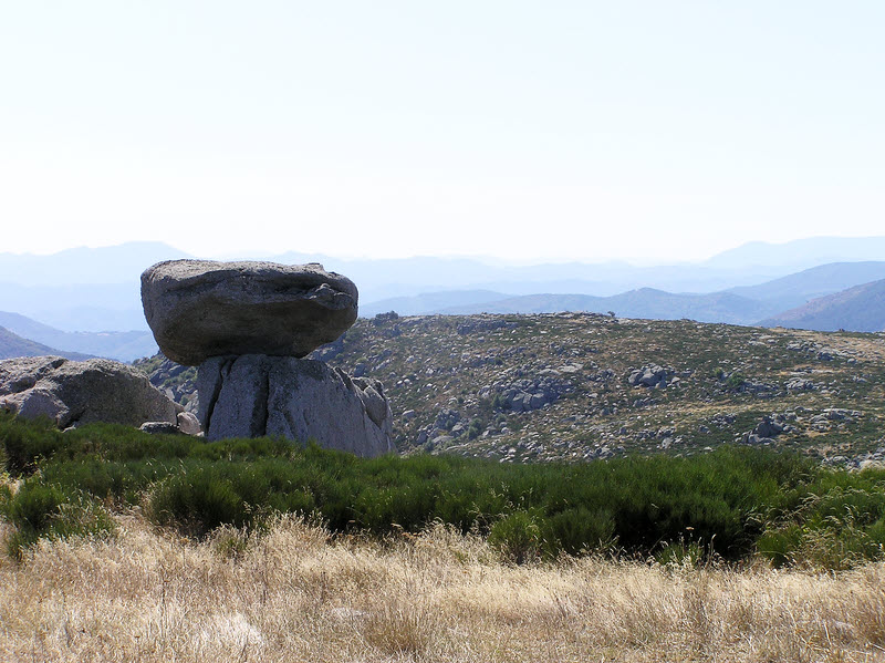 The vast empty stony landscape is covered in patches of broom.� (140k)