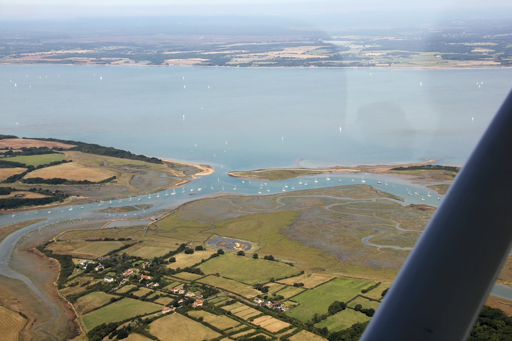 Newtown Creek on the north-west side of the IoW. Yachts can enter at high tide, and it's a lovely quiet place to spend the night at anchor, 
					but you have to wait until the next high tide to get out again.