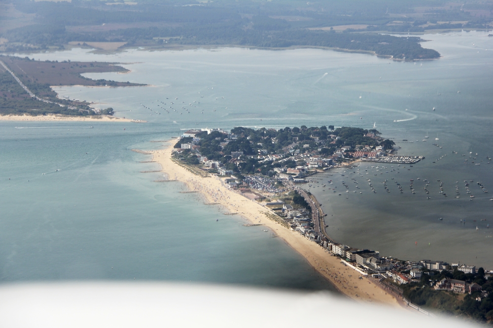Sandbanks, one of the most expensive places to live in the UK, at the entrance to Poole Harbour, the second largest natural harbour in the world.
