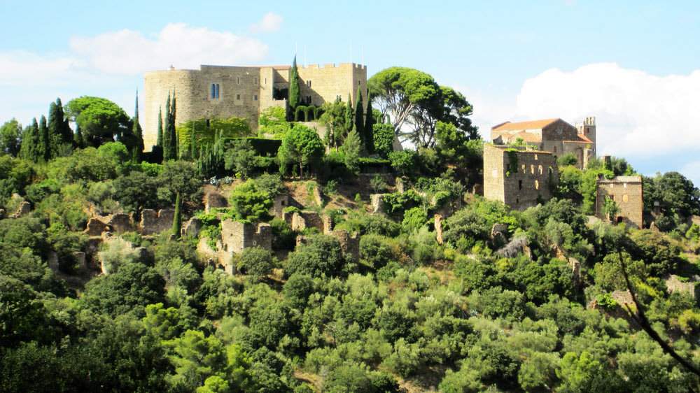 The Chateau of Corbère, with its chapel to the right, and the abandoned old village of Corbère is below them.