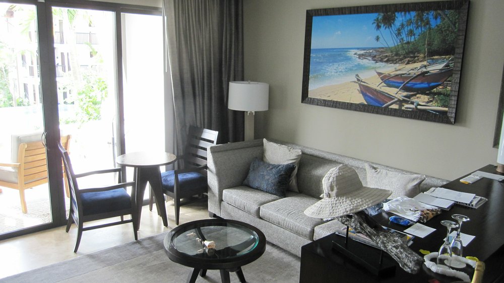 A corner of the seating area, with the door to the veranda and pool at the left.