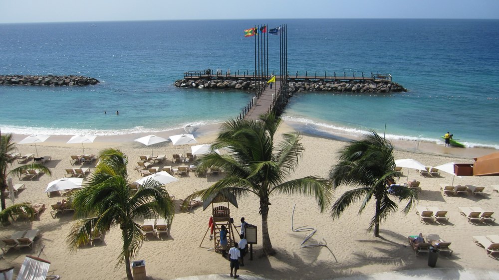 From the top of the front Pink Gin building, showing the two protected swimming areas.