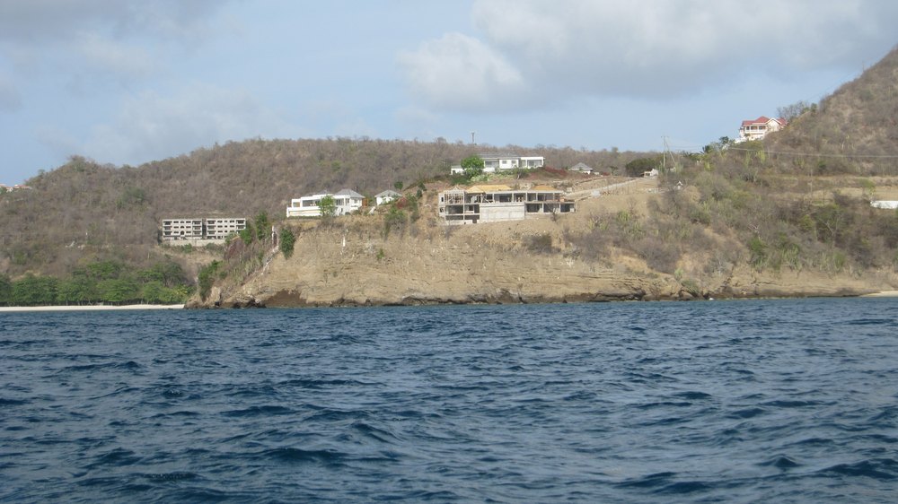 Shahim told me that Oprah Winfrey owns this promontory and the grey-roofed buildings on top of it, and is having a massive 
					luxury villa built overlooking the ocean.