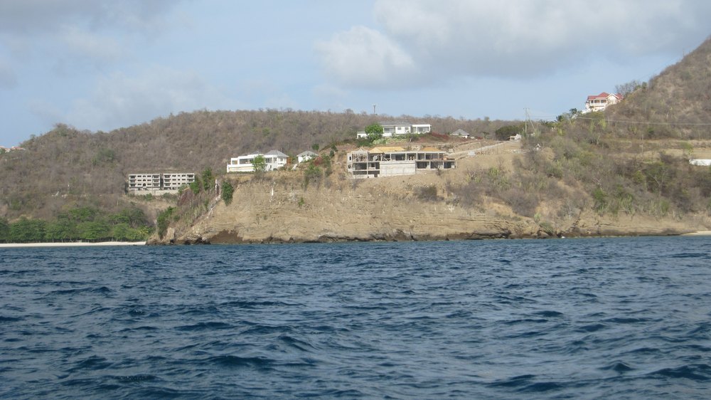 Shahim told me that Oprah Winfrey owns this promontory and the grey-roofed buildings on top of it, and is having a massive 
					luxury villa built overlooking the ocean.