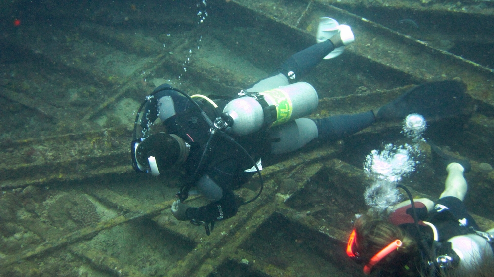 Dive master Adrian leads us into the hold of the Veronica L.