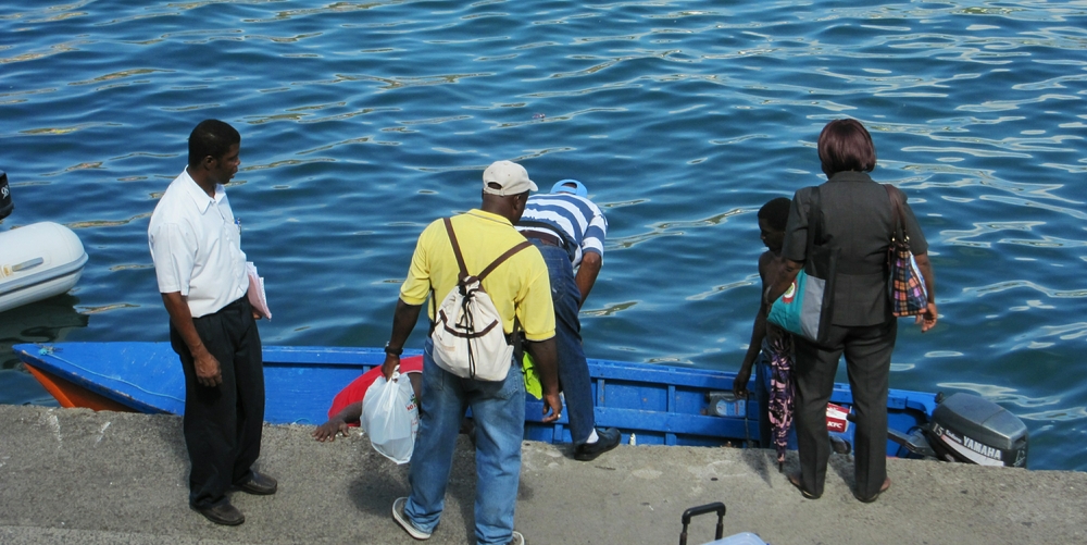 From the upstairs window we watched a couple of fishermen tie up their dinghy and sell their catch to passers-by.