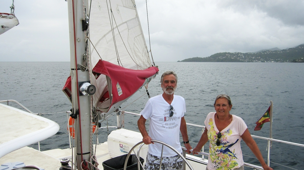 Helming a big catamaran during a Sunset Sail from St George's to Sandals and back.