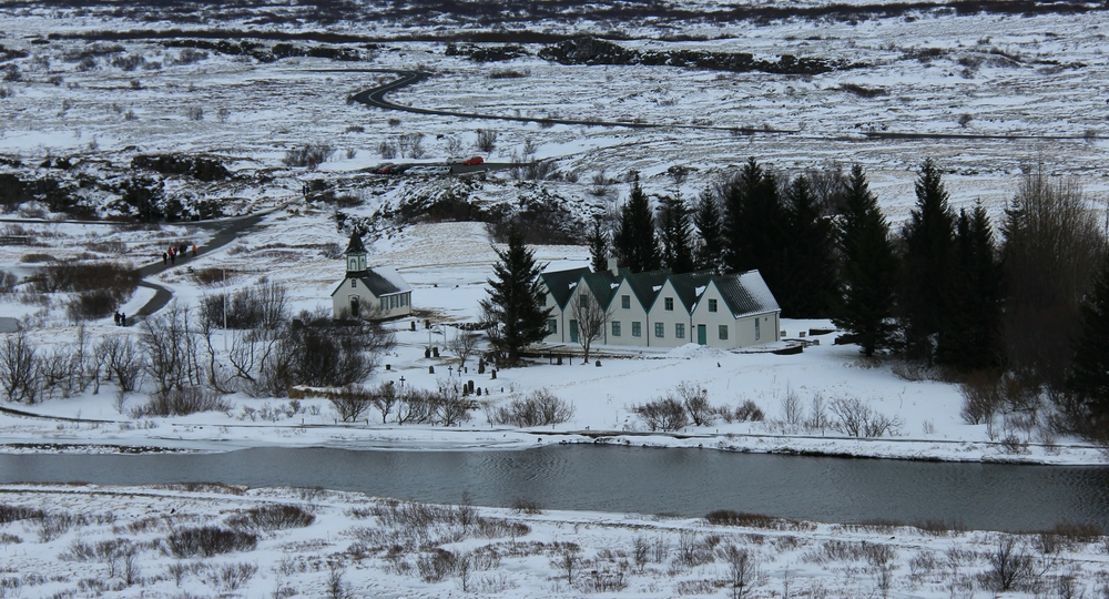 Just visible in the bottom-right corner of the previous photo, here are a church and accommodation for visitors. The Icelandic 
					head of state welcomes visiting heads of state to this historic location.