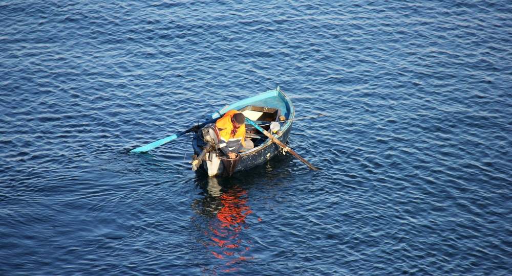 Fishermen came right into the shallows under our balcony early in the morning. 