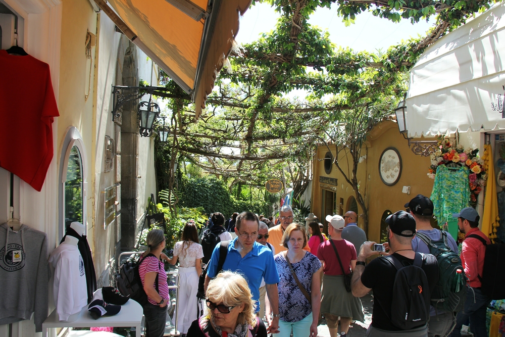 Walking down the crowded lanes of Positano to the beach.