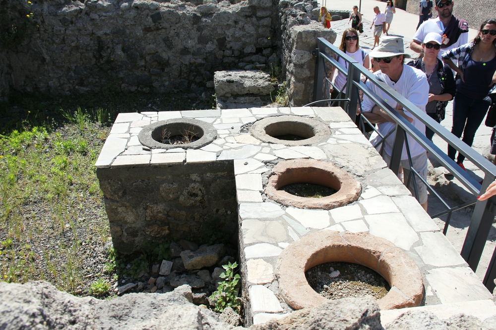 We were impressed by how many shops there were in the town. This is a fast food joint, with pots that would have contained foods bubbling away above a fire. 