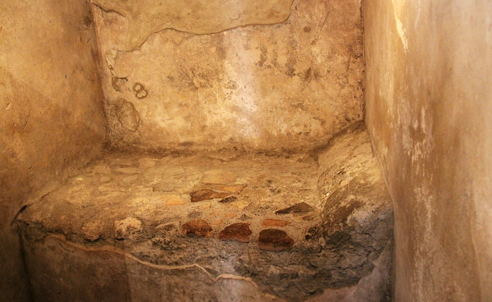 The beds in the rooms were made out of stone - presumably to encourage the customers not to linger.