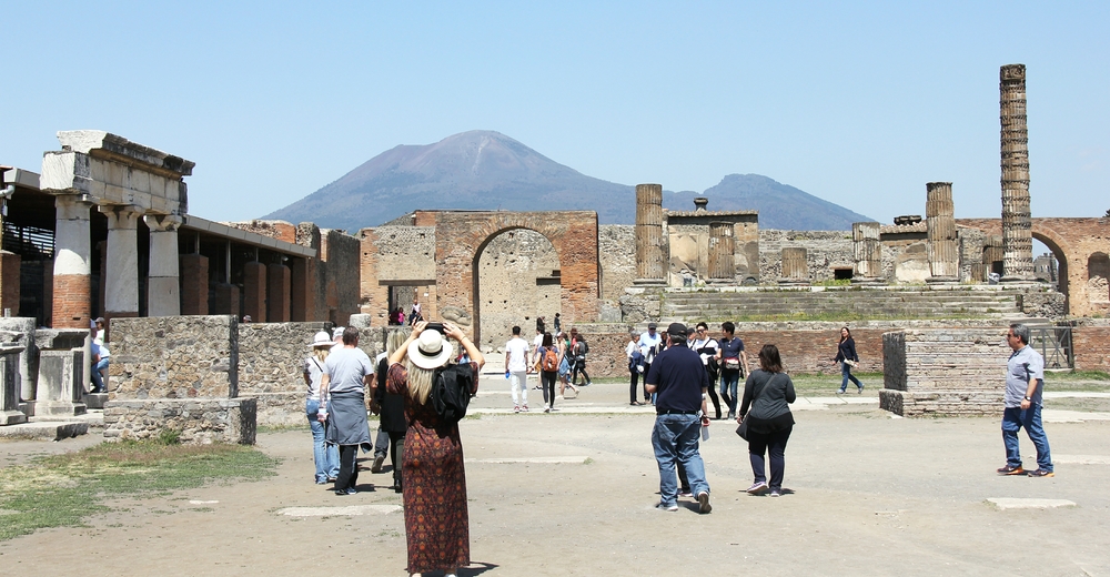 Looking in the opposite direction, with the Temple of Jupiter in front, but the continual brooding presence of Vesuvius not far behind it.