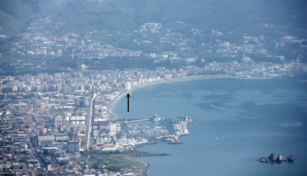 Maximum zoom into the previous photo, showing Hotel Miramare (arrowed) on the seafront.