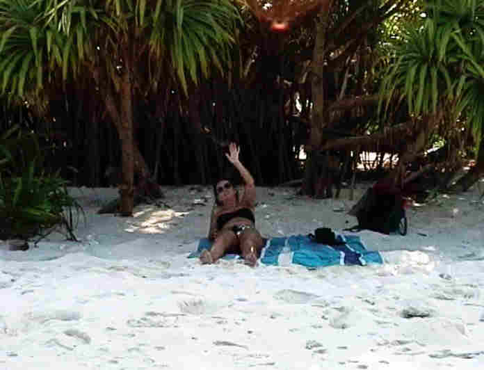 Linda on the beach of an uninhabited island near Ellaidhoo in Ari Atoll