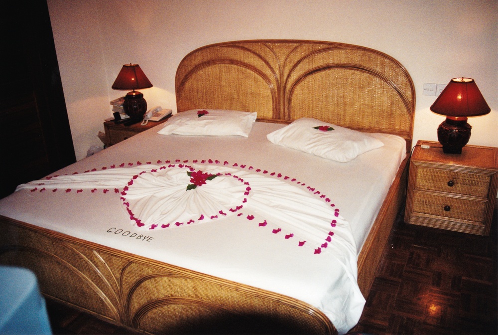 On our departure, the room boy decorated our bed with bougainvillea and hibiscus.