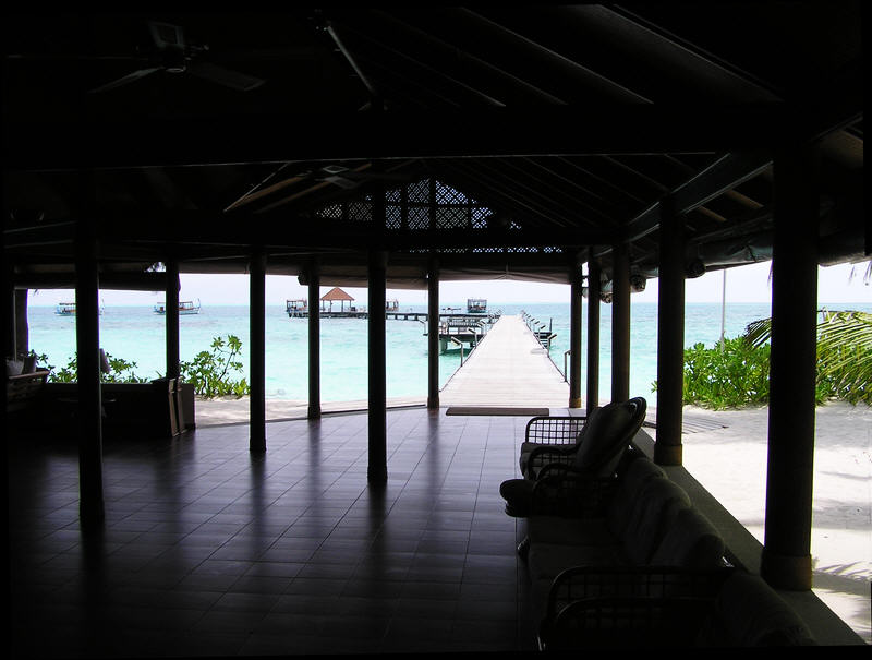 View from Reception up the jetty. Everything arrives on the island along this jetty - food, water, diesel, staff, guests.  (64k)