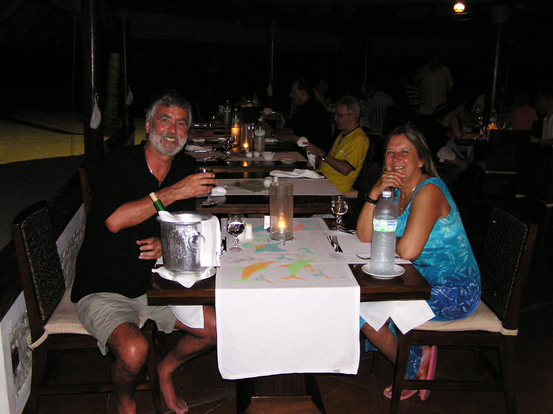 On our last night at Athuruga our waiter decorated the table with dolphins in coloured rice. (72k)