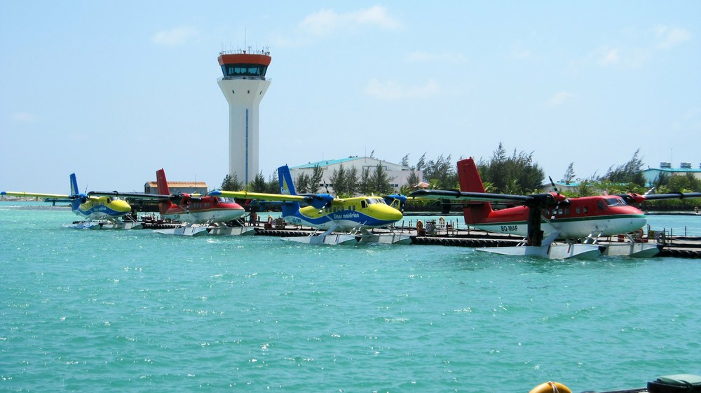 One big happy family. TMA and ex-MAT Twin Otter seaplanes cuddling up to each other in harmony at Male airport.