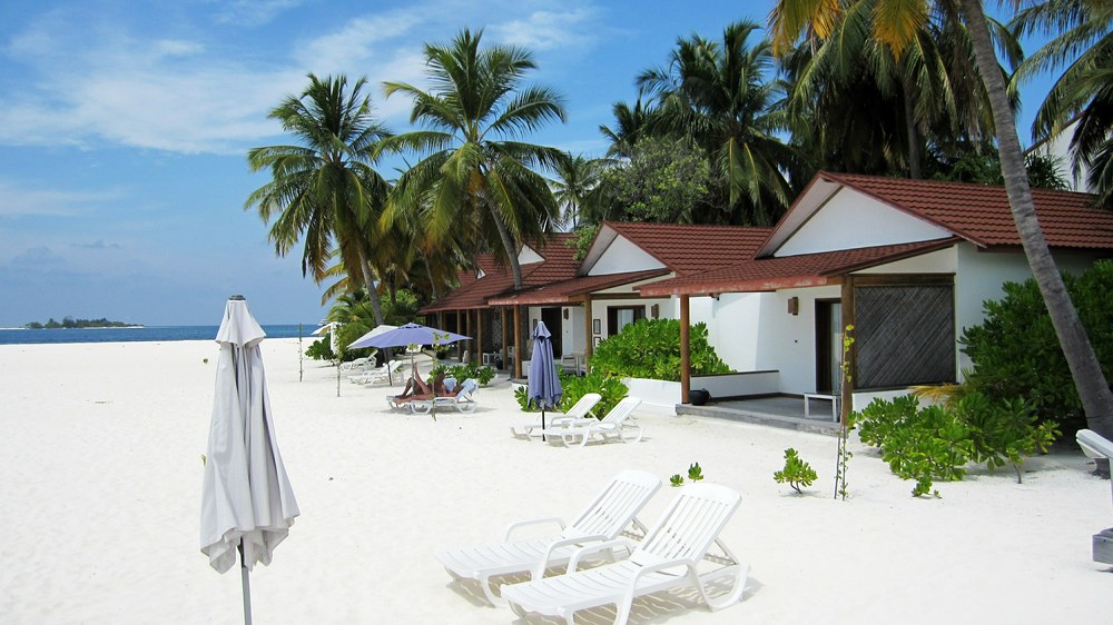 The view of the jetty from outside rooms 1 to 4. Plenty of beach now. Compare to this view of this area in 2009 when it was suffering 
					from severe erosion.