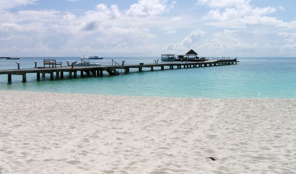 The view of the jetty from outside rooms 1 to 4. Plenty of beach now. Compare to this view of this area in 2009 when it was suffering 
					from severe erosion.