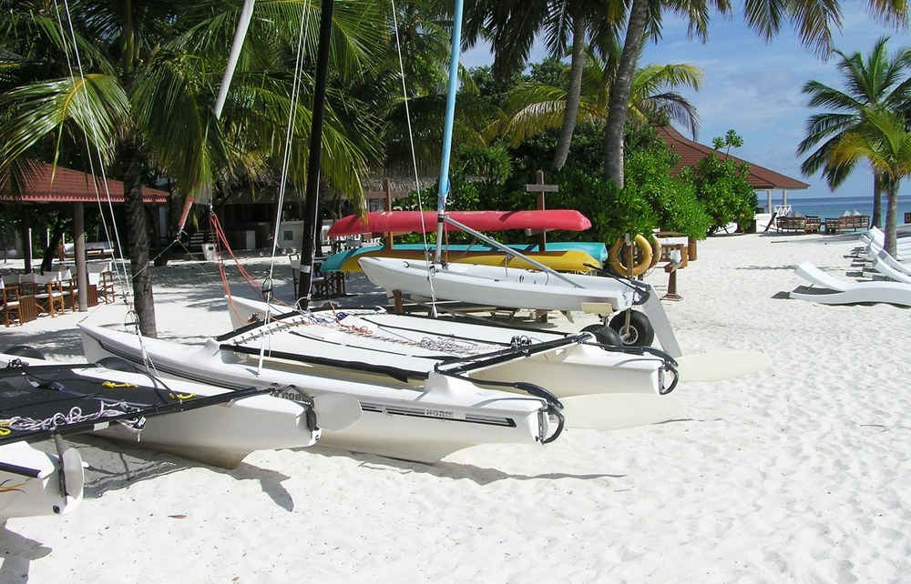 Outside the watersports centre: canoes, Hobie cats, and a dinghy. Water-skiiing is also available for a price.