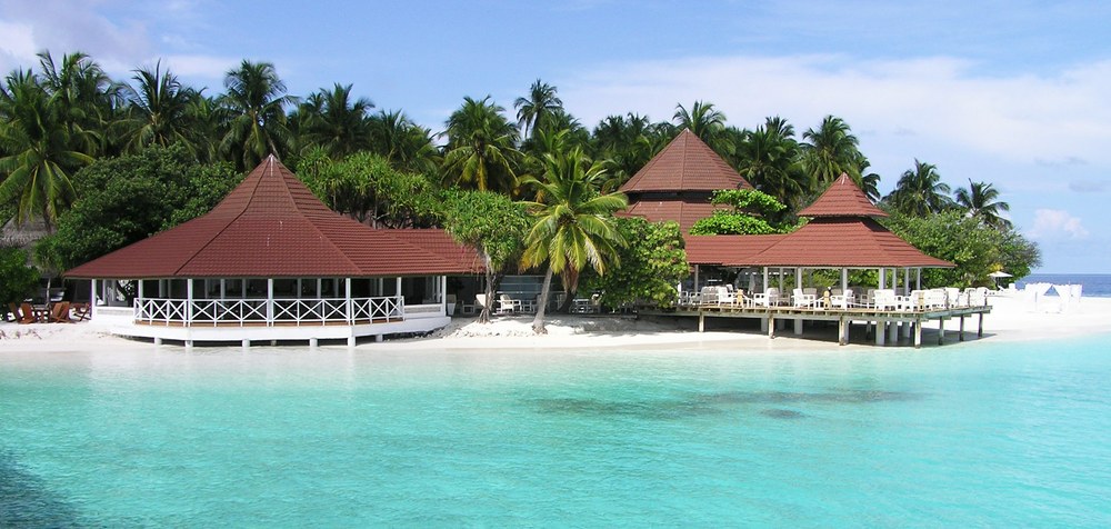 The main bar at the left, and the relaxing deck area at the right, with the roof of the restaurant area visible behind it.