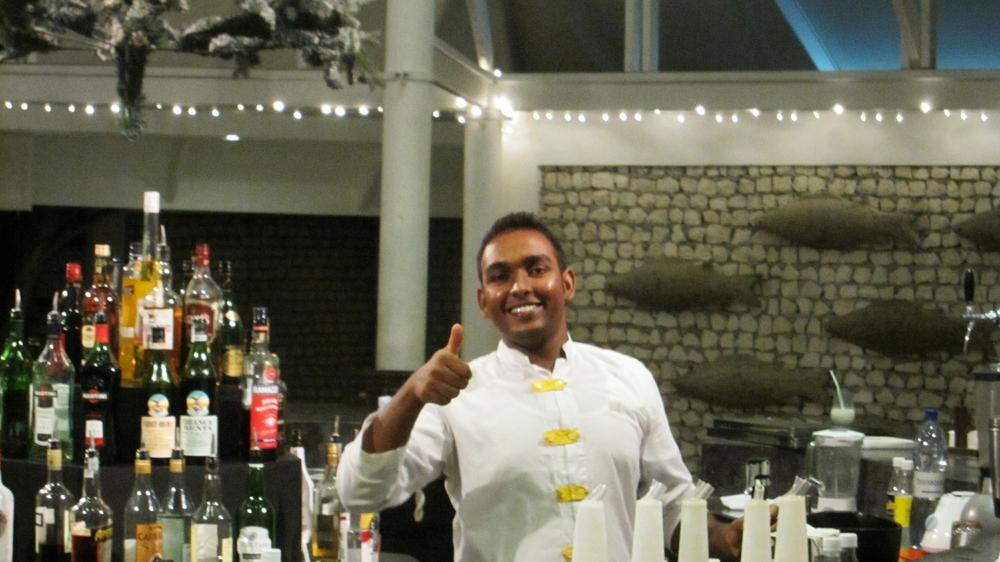 Barman Udaya enters into the Christmas spirit, too.