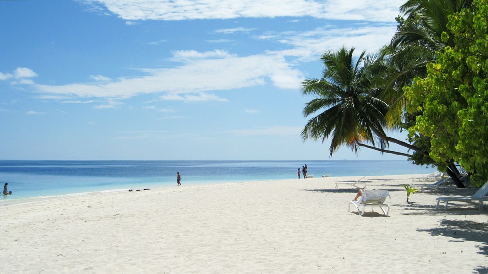 Step off the veranda onto the white coral sand, and the view is glorious.