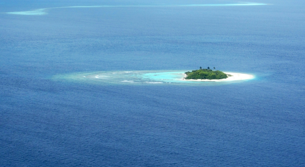 An uninhabited desert island for sale. Any takers?