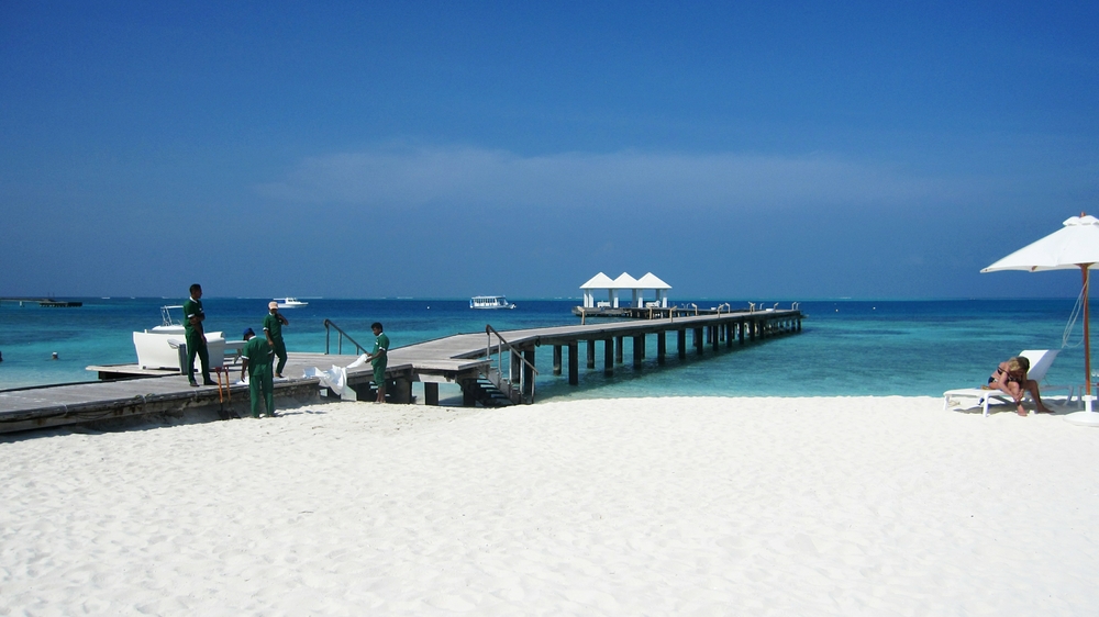 The Maintenance team continue to fill sandbags with sand from beside the main jetty.