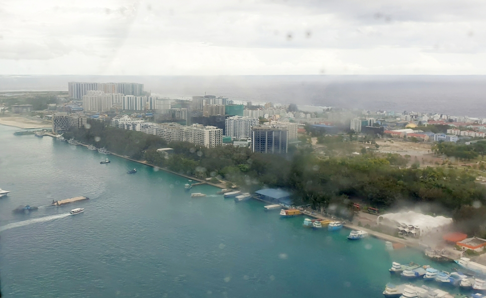 A few seconds after take-off in the seaplane at Malé on our way to Thudufushi. Looking out over the artificial island of Hulhumahe. This island didn't exist 25 years ago - it's for Male overspill.