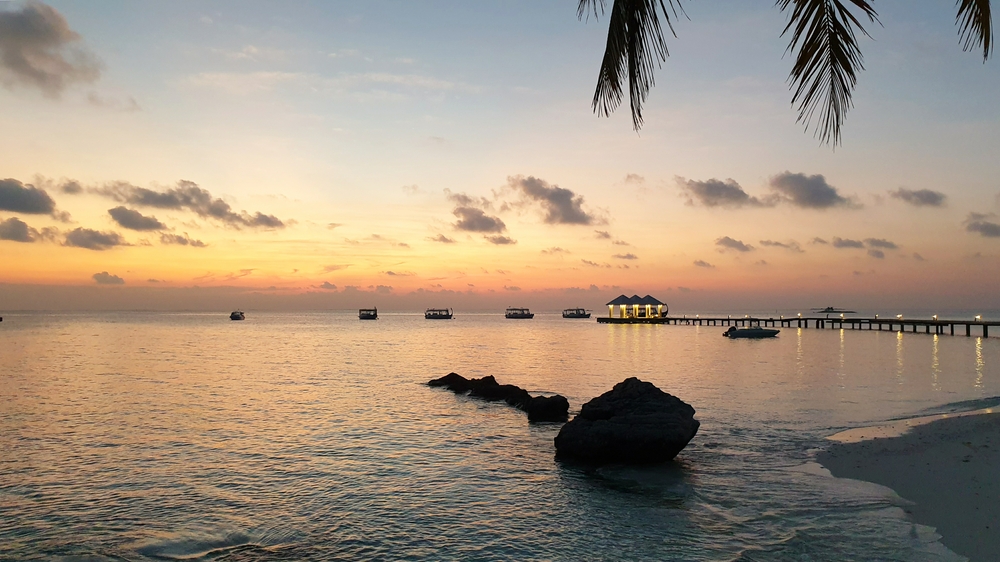 The main jetty from the Water Villa jetty at sunset.