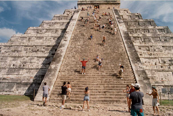 John descending the steps.  The Mexican authorities have
          threatened to stop people treading all over the pyramid in an attempt to reduce erosion (49k)