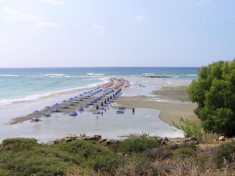 It had been raining hard earlier this day, and the beach was awash.  (98k)